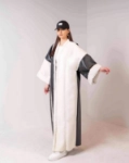 Picture of Saudi Women's long black fur jacket with white side