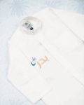 صورة White Dishdasha with Blue Crescent Embroidery Al Jazeera For Kids - Ramadan Edition (With Name Embroidery)